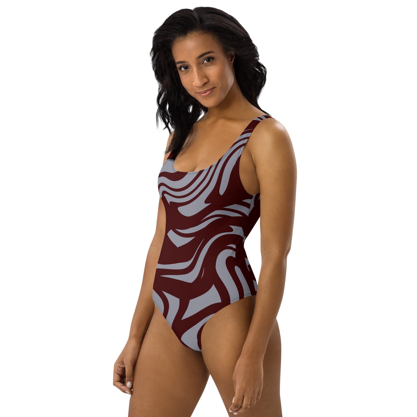 all-over-print-one-piece-swimsuit-white-left-6788de8e0a943.jpg