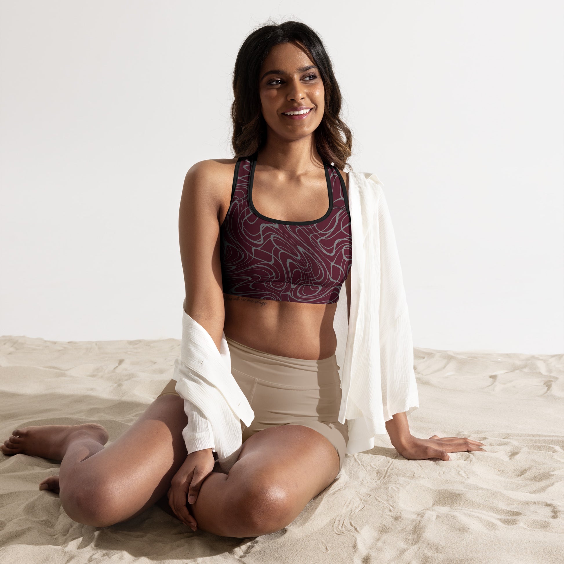 all-over-print-padded-sports-bra-black-front-2-67867abd05ace.jpg