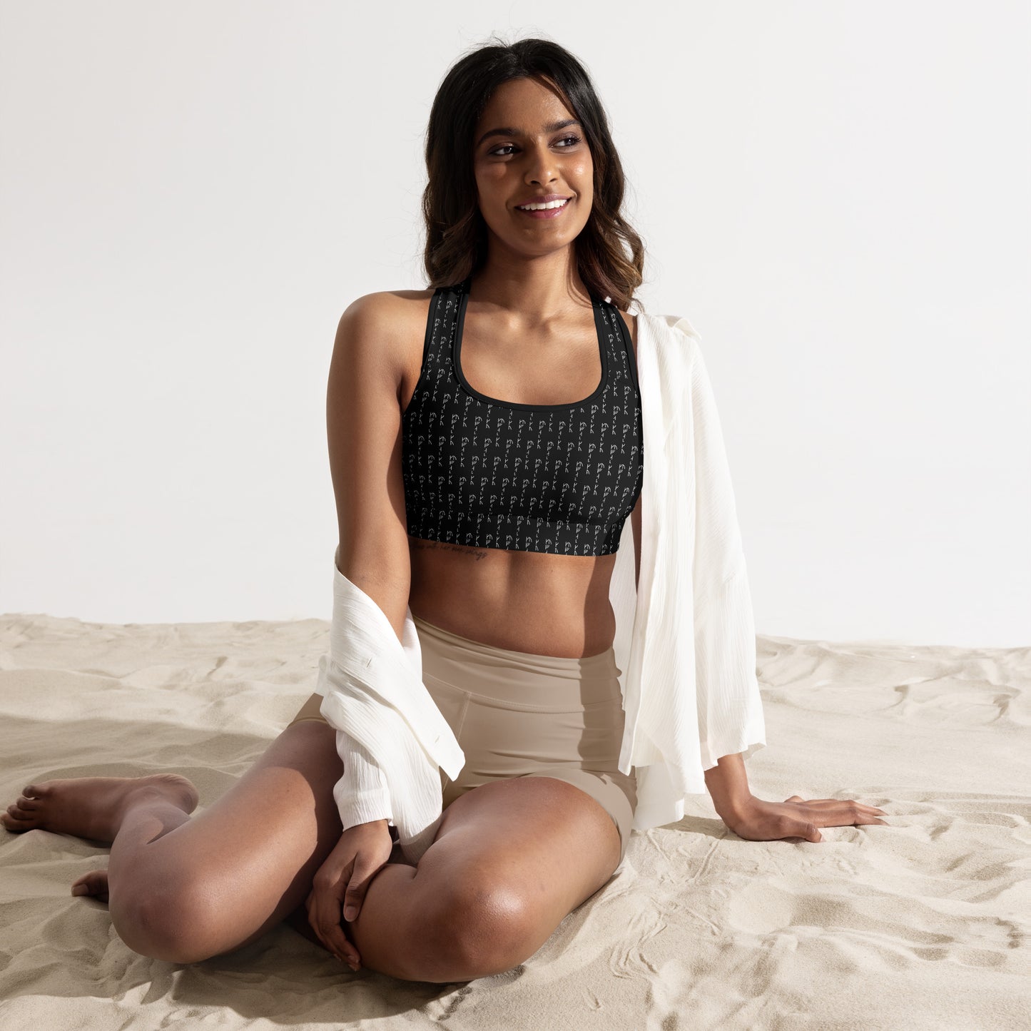 all-over-print-padded-sports-bra-black-front-2-67dd16de3a140.jpg