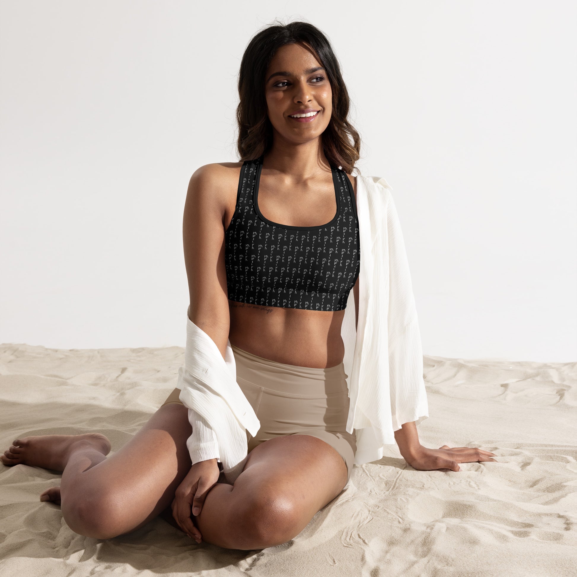 all-over-print-padded-sports-bra-black-front-2-67dd16de3a140.jpg